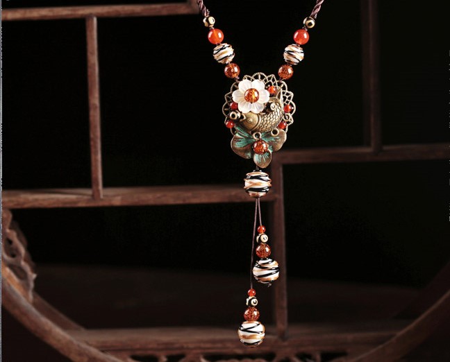 復(fù)古風(fēng)琉璃吊墜毛衣鏈,魚影風(fēng)銷項(xiàng)鏈