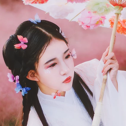 蝶花帶傘女生頭像，唯美古風(fēng)真人頭像