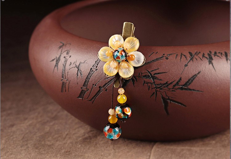 陽(yáng)光花朵發(fā)夾，清新淡黃花頭飾