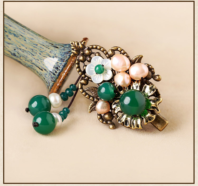 文藝復(fù)古花形朵發(fā)夾，氣質(zhì)典雅翠綠頭飾