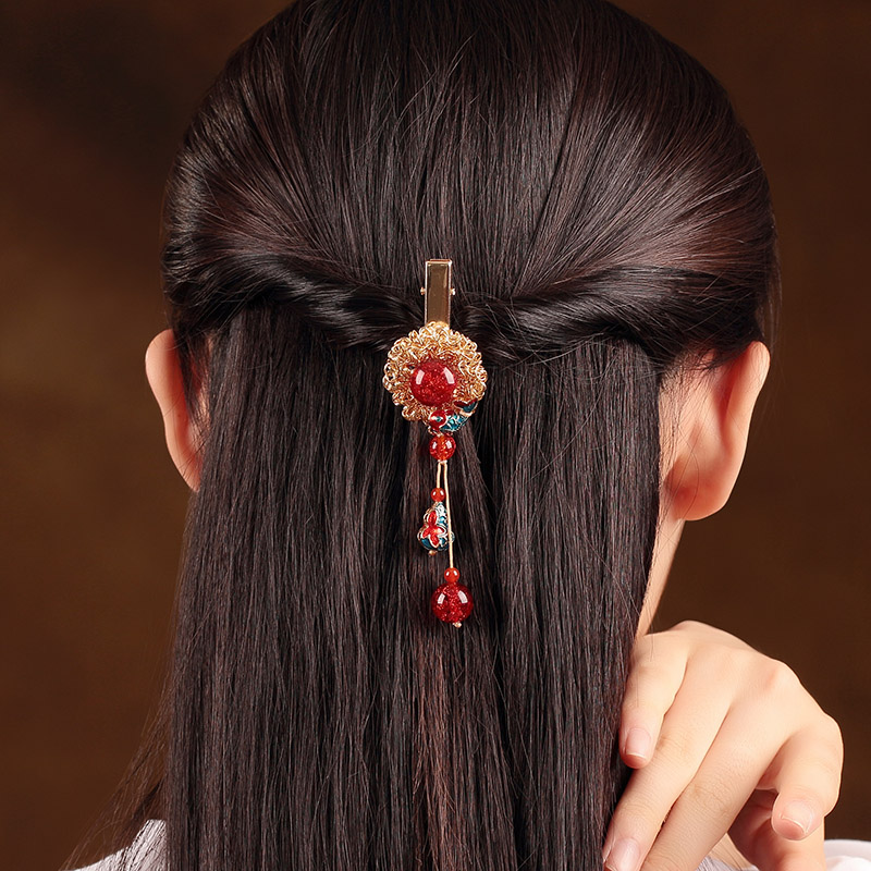 驚艷魚悅發(fā)夾：一顆耀眼的紅珠