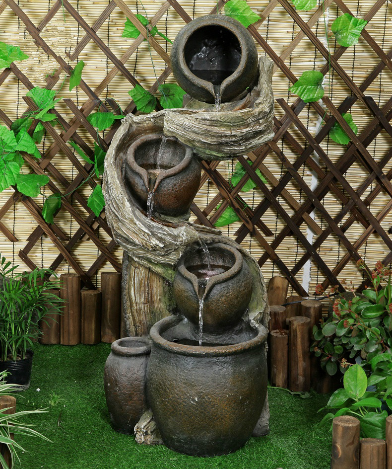 聽涓涓細流的假山，看水鄉(xiāng)故事假山石