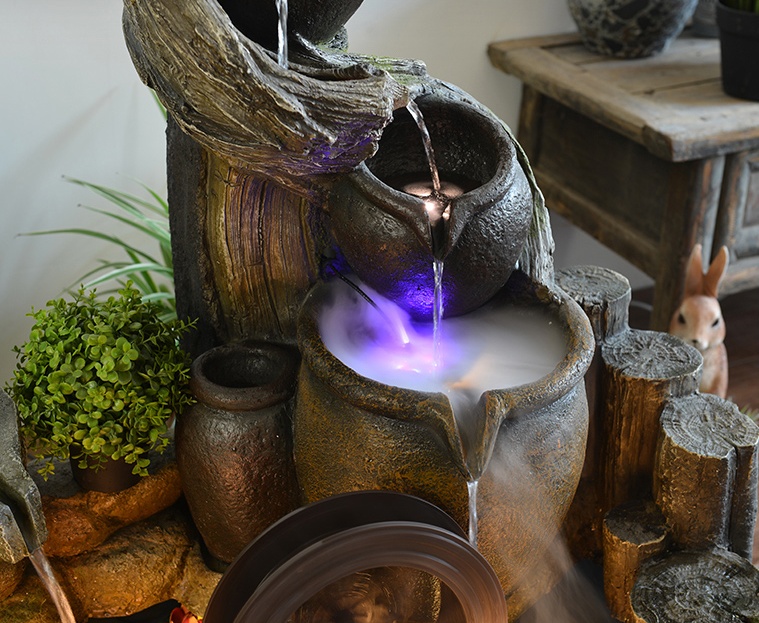 聽涓涓細流的假山，看水鄉(xiāng)故事假山石