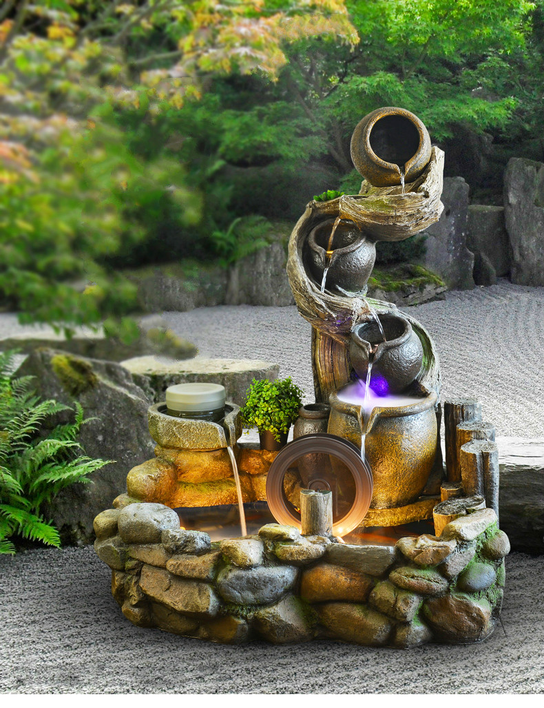 聽涓涓細流的假山，看水鄉(xiāng)故事假山石