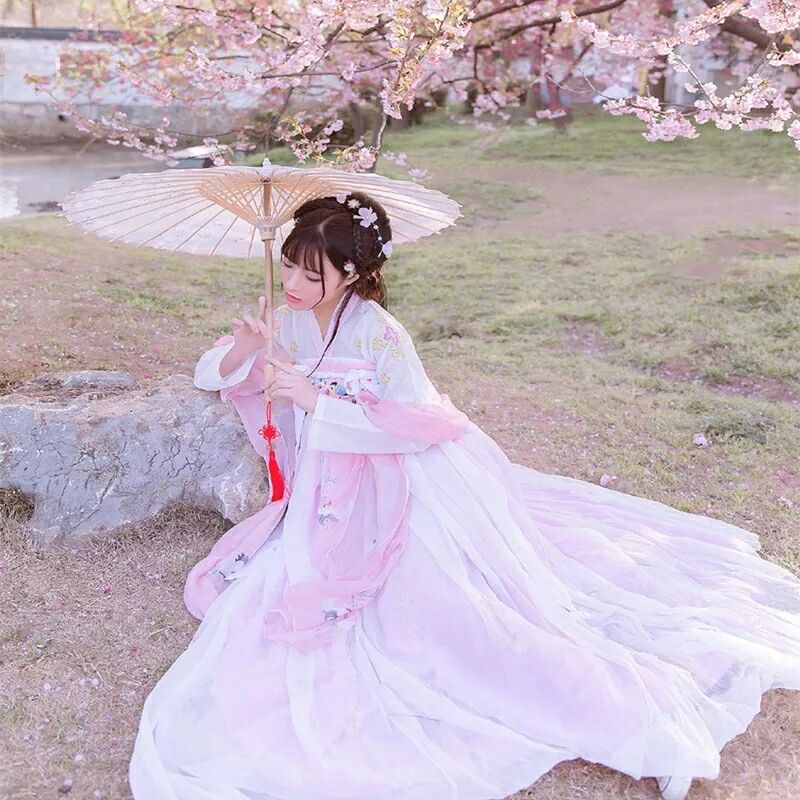 傳統(tǒng)華夏粉色漢服，漢元素清新淡雅漢服圖片