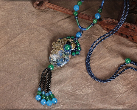 孔雀藍(lán)瑪瑙石頭吊墜毛衣鏈項(xiàng)鏈?zhǔn)罪? / data-kCJy=