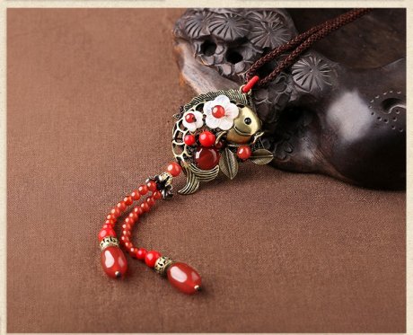 紅色氣質(zhì)古風(fēng)貝殼花毛衣鏈項鏈?zhǔn)罪? / data-6lRx=